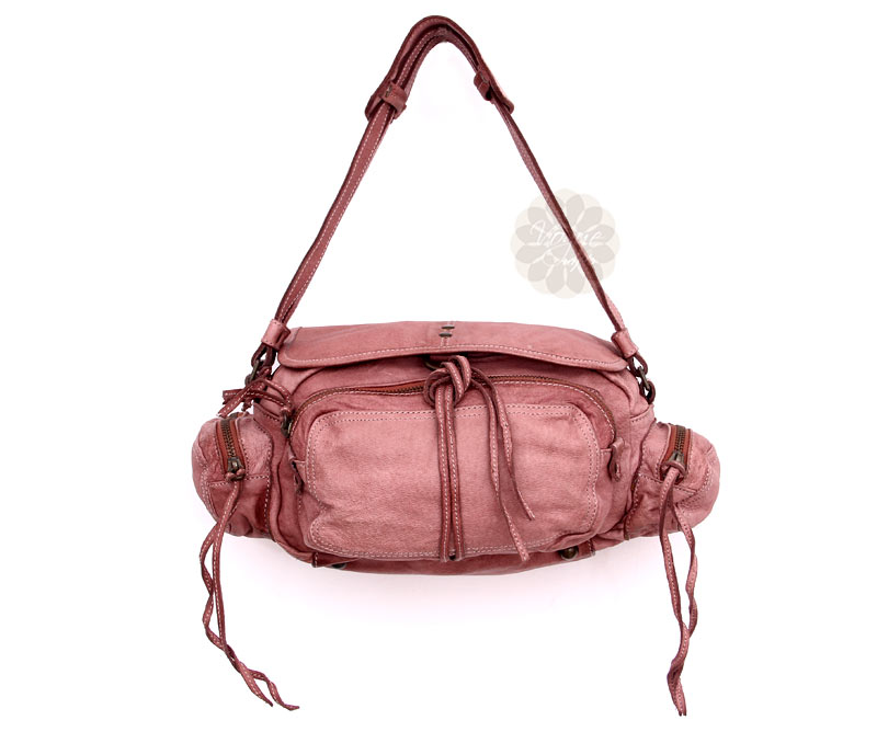 Vogue Crafts & Designs Pvt. Ltd. manufactures Fancy Pink String Handbag at wholesale price.